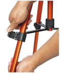 Hands adjusting height on Lightweight Aluminum Tripod With Mount For Laser Levels And Tools Flexible And Stable On Uneven Terrain