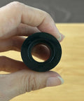 Heavy Duty Motorcycle Sprocket Tensioner Rubber Sliders For Slick Chain Tracking And Awesome Ride Vibes Riders Grab This 20 Pack Idler Pulley Guide Cover Kit For Street Bikes featuring black rubber slider held in hand.