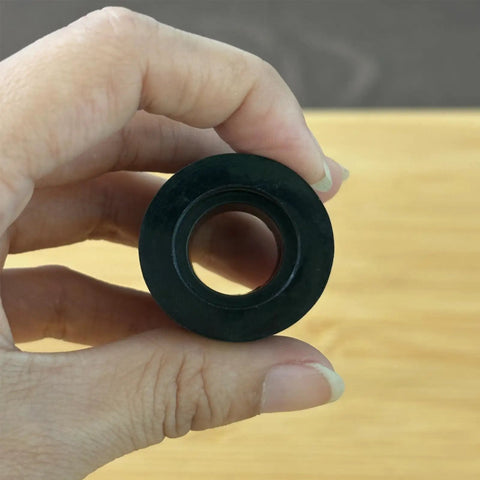 Heavy Duty Motorcycle Sprocket Tensioner Rubber Sliders For Slick Chain Tracking And Awesome Ride Vibes Riders Grab This 20 Pack Idler Pulley Guide Cover Kit For Street Bikes featuring black rubber slider held in hand.