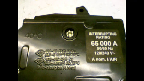Close-up view of QOB220GFI Miniature Circuit Breaker 120 And 240 Volt 20 Amp GFI Molded Case with labeling details.