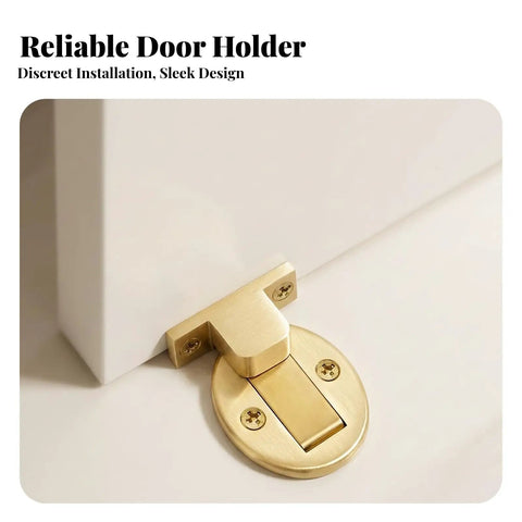 Solid Low Profile Floor Door Catch In Sleek Black Metal For Secure Entryways Durable Heavy Duty Installation Keeps Doors Tight And Closed Perfect For Homes, gold door holder with discreet design.