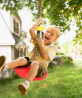 Child enjoying Climbing Rope Tree Swing With Platforms And Seat For Kids Kid-Friendly Outdoor Playground Accessories With Hanging Straps