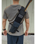 Man wearing Lightweight Back Archery Quiver, Dual Use Foldable Hip Arrows Bag With MOLLE Pocket, black, for target shooting, back view