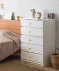 White dresser with Gold Cabinet Knobs 25 Pack for Dresser and Furniture, Knurled Diamond Surface Metal Drawer Pulls installed.