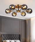 Mid Century Glass Orb Chandelier With Brass Finish Semi Flush Ceiling Light With Radial Design Six Light Fixture in bedroom