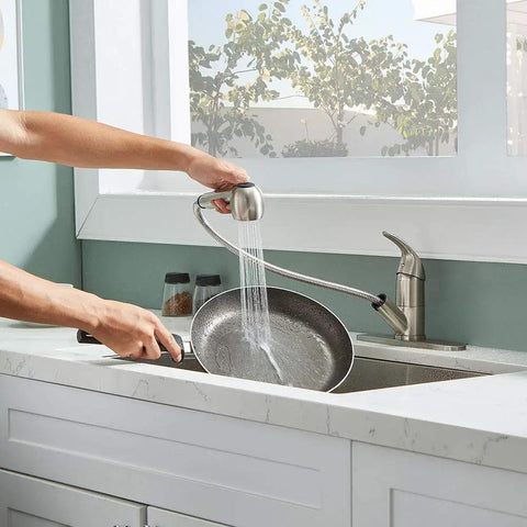 Stainless Steel Brushed Nickel One Handle Pull Out Sprayer Bar Kitchen Faucet For Small Sinks With Escutcheons in use