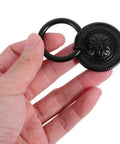 Hand holding a Vintage Style Drawer Pull from set of 4 Retro Flower Cabinet Handles, 36mm black antique dresser hardware for cabinets.