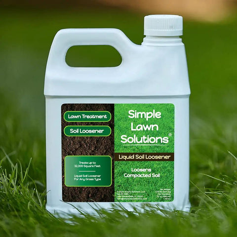 Front view of Liquid Soil Loosener and Soil Conditioner bottle for compact soils by Simple Lawn Solutions placed on grass.