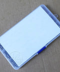 Plastic box containing 300Pcs 304 Stainless Steel Split Spring Dowel Roll Pins Kit In 2mm 3mm 4mm Sizes on a cardboard surface