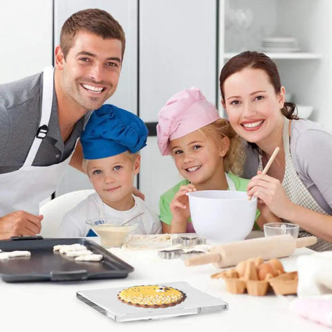 Slick Square Acrylic Cookie Decorating Turntable With Anti Slip Silicone Mat Easy Peasy Setup Kitchen Gamechanger in use by a family.