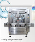 Automatic Liquid Filler And Capping Machine For Cooking Oil And Beverage Packaging Built Different With Smooth Dual Head Sealing Flow and sleek stainless steel design.