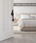 Foot Operated Door Stop For Hands Free Entryway Access, Zinc Alloy Floor Holder in bedroom setting, door partially open