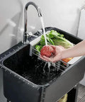 Heavy Duty Freestanding Slop Sink With Built In Storage Shelf For Kitchen Workshop Laundry And Garage Durable PP Material Holds Up To 200kg One Button Drain Black 60x40x76.5cm, water flowing over vegetables and fruit