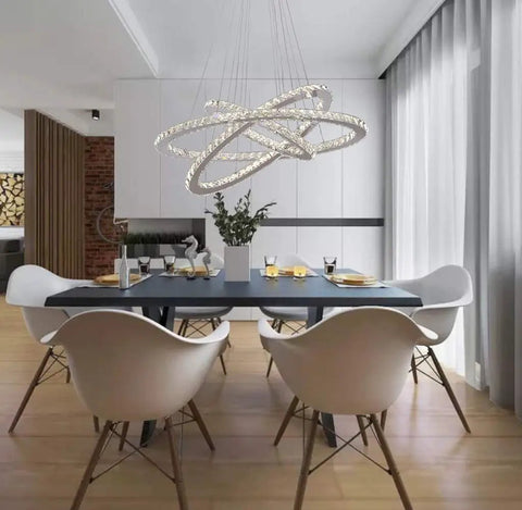 Lit Three Ring LED Crystal Chandelier With Stainless Steel Frame, Dimmable Brightness, 4000K LED in a modern dining room