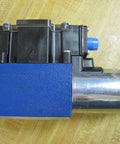 Directional control solenoid R978031711 2WE6Y62/EG24 N9DK24L2/62 24 VDC hydraulic proportional valve, black and blue casing