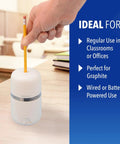 Two In One Battery And Electric Fully Automatic Pencil Sharpener For Regular Graphite And Drawing Pencils With Auto Feed And Auto Eject Adjustable Tip Size Includes AC Adapter Office And School Use White in classroom setting.
