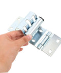 Hand holding Heavy Duty Garage Door Hinges With Thickened Metal Construction And Double Bearing Pivot Industrial Gate Corner Hinge In Silver For Warehouse And Factory Use Low Maintenance And Durable Door Hardware