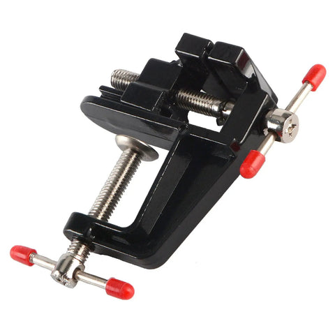 Compact Mini Vise Clamp With A Rock Solid Hold For Woodworking Carving And Jewelry Diy Tasks Dead Simple Table Clip Mount Black Finish close-up angle showing details of the clamp mechanism.
