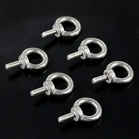 Close-up of 304 Stainless Steel M5 Eyebolts Set with Lock Nuts Lock Washers and Flat Washers 36 Pieces for Lifting and Machinery Use Built Tough for Real Rigging Gear on black background.