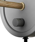 Close-up of matte gray backplate with faux wood accents for Plug In Or Hardwire Wall Sconce 2 In 1 Dimmer Backplate Matte Gray With Faux Wood Accents Black Fabric Cord Dimmable Wall Light Bulb Not Included Easy Install For Cozy Cottagecore Vibe