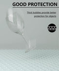 A glass tumbler falling onto cushioning material, illustrating protection benefits of 6x9 Inch Bubble Mailer 50 Pack Waterproof Padded Envelopes.