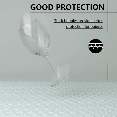 A glass tumbler falling onto cushioning material, illustrating protection benefits of 6x9 Inch Bubble Mailer 50 Pack Waterproof Padded Envelopes.
