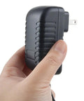 Hand holding AC Power Adapter For Casio CDP S100 88 Key Digital Piano Keyboard Replacement Power Supply CE FCC RoHS Certified