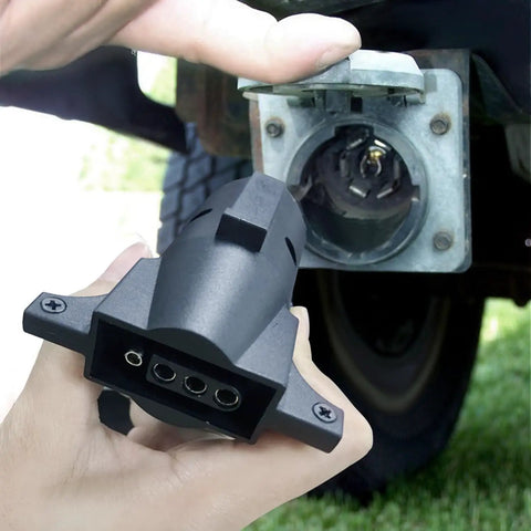 7 Way To 4 Way Flat Trailer Adapter Waterproof Rugged Nylon Housing 7 Pin To 4 Pin Wiring Connector being connected to truck