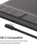 Close-up of the Compact Drawing Tablet With Slick Scroll Wheel And Ergonomic Stylus Delivering Sick Precision And Butter Smooth Pressure Response, showing USB-C port and buttons.