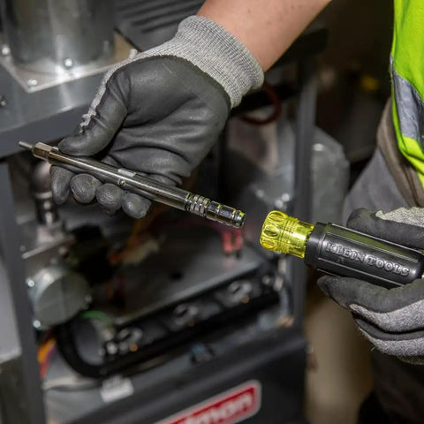8 In 1 Magnetic Screwdriver And Nut Driver With Sliding Head for HVAC in use, close-up on hands adjusting tool details.