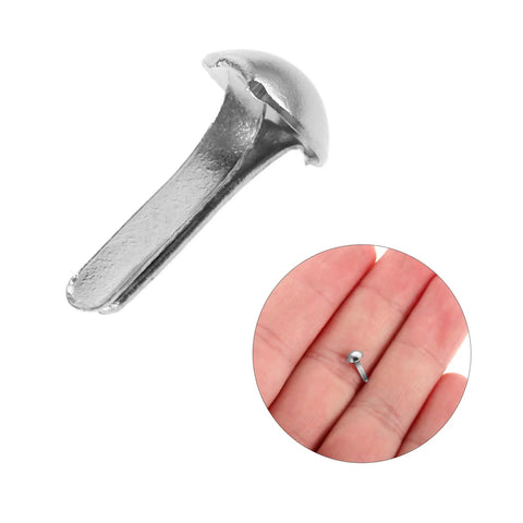 Close-up of Mini Iron Brads For DIY Projects 100 Pack Paper Craft Fasteners For Shadow Puppet Making Kit And Scrapbooking Embellishments