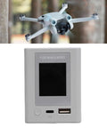 Drone Battery Charger Hub With 45W PD Fast Charging And LCD Display For Mini 3 3 Pro 4 Pro Batteries shown with drone.