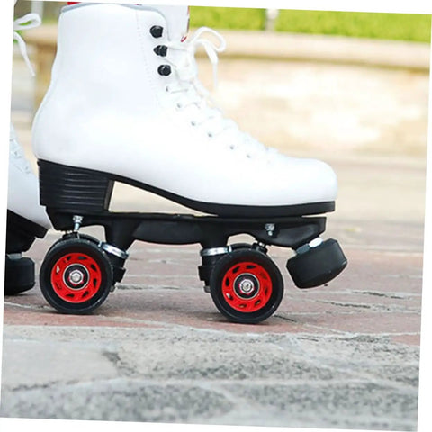 2 Pcs Adjustable Rubber Toe Stops for Roller Skates attached to white quad skates on outdoor pavement