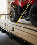 Lock Down Your Rig With 10 Piece 1/4 Inch Steel D Ring Tie Down Anchors 2400 Lbs securing ATV with lashing hooks on trailer.