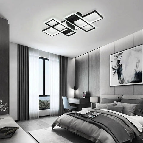 Dope Black 95W Flush Mount LED Ceiling Light With Four Interlocking Squares Modern Windmill Design in a bedroom setting