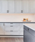 Modern kitchen with Oil Rubbed Bronze Cabinet Pulls With 3 Inch Centers Arch Style Handles on white cabinets.