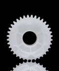 Close-up of white gear from 550 Gear Box Kit For Kids Ride On Cars All In One Large Middle And Small Gears Drive Accessories Set
