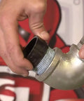 Hands applying Megaloc Multi-Purpose Thread Sealant Can Blue Liquid Paste 8 Oz 236 Ml One Half Pint Kevlar Reinforced to pipe connection.