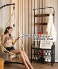 Woman relaxing in Hanging Chair For Bedroom Hammock Swing With Lights And Hardware Kits Holds Up To 550 Lbs Macrame Cotton Rope Chair