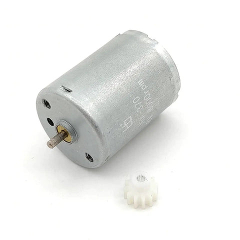 Pro Tier 24mm Electric Motor Delivering Smooth Low Noise Torque With Rock Solid Dust Resistant Housing For Continuous All Day Grind 3V To 12V Up To 12500 Rpm In Hobby Or Shop Builds with silver metal casing and drive shaft.