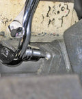 Close-up of 36 Piece Master Torx And Hex Socket Set for 1/4 inch drive in use on machinery, showing socket detail and grip.