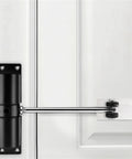 Simple Household Automatic Door Closer With Silent Close Invisible Mount 160 Mm X 126 Mm, black finish, installed on white door.