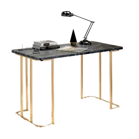 Adjustable Standing Computer Desk With Built Storage And Power Port, Sleek Faux Marble Work Table For Home Office, Gold Metal Frame study setup with lamp and books.