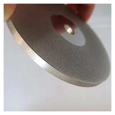 Close-up of Double Sided Lapidary Diamond Grinding Disc Wheel 100mm Four Inch Diameter Ten Millimeter Thickness Pro Grade Ceramic Alloy