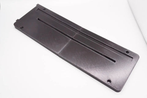 Bosch PTS10 Table Saw Zero Clearance Throat Plate Insert With Two Piece Design on white background, angle view.
