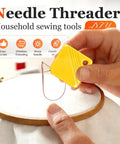 Close-up of automatic needle threader for hand sewing and sewing machines, with yellow durable plastic design for easy use.