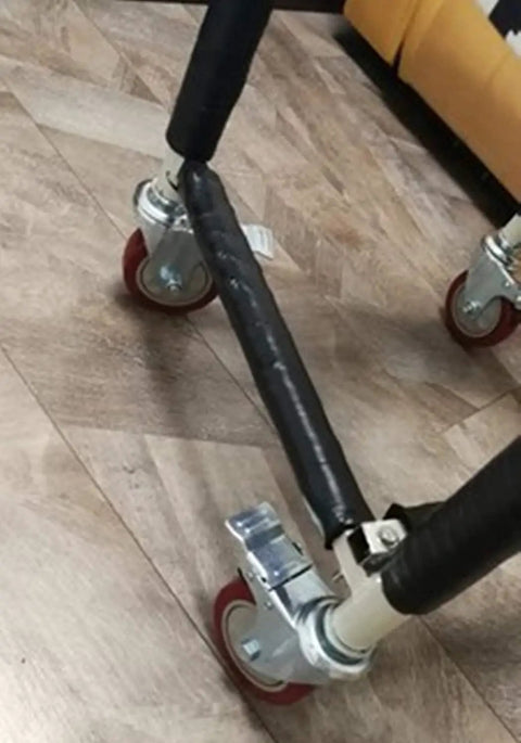 Built Tough Pro Grade Heavy Duty Polyurethane Swivel Caster Wheels With Threaded Stem seen on trolley, rolling quietly on hard flooring.