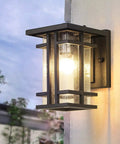 Retro Outdoor Wall Light With Clear Seeded Glass Shade In Black Finish, IP65 Waterproof Exterior Wall Lantern, mounted on wall