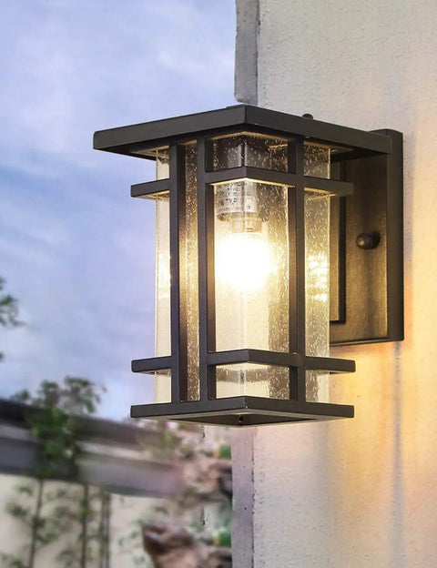 Retro Outdoor Wall Light With Clear Seeded Glass Shade In Black Finish, IP65 Waterproof Exterior Wall Lantern, mounted on wall