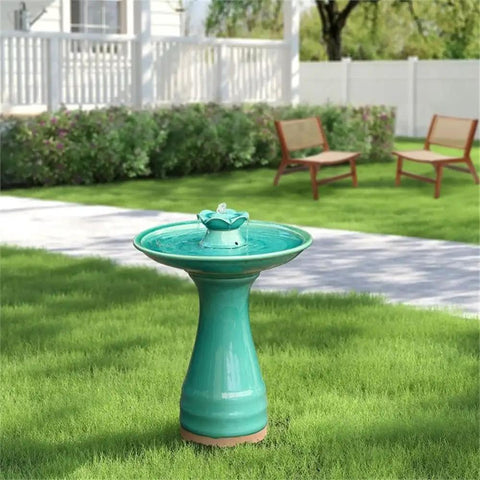 22 Inch Ceramic Bird Bath Fountain With Lotus Design in a garden setting, freestanding, aqua green glazed, weather resistant.